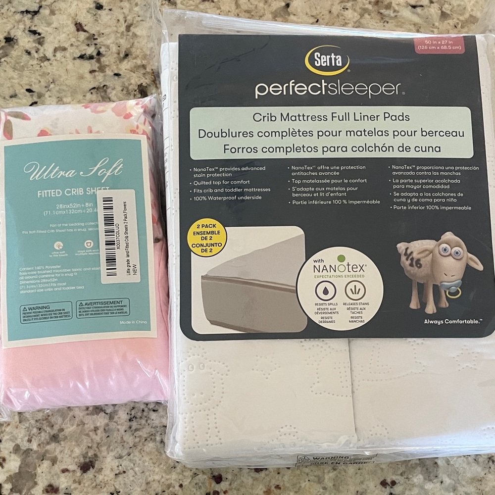 2 pack Serta Crib Mattress Liner Pads and 2 pack Crib Sheets BRAND NEW